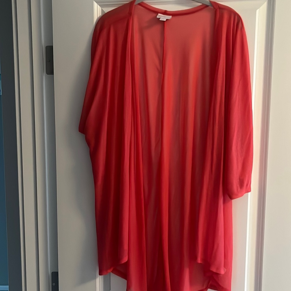 Medium pink lularoe lindsey! Never been worn!